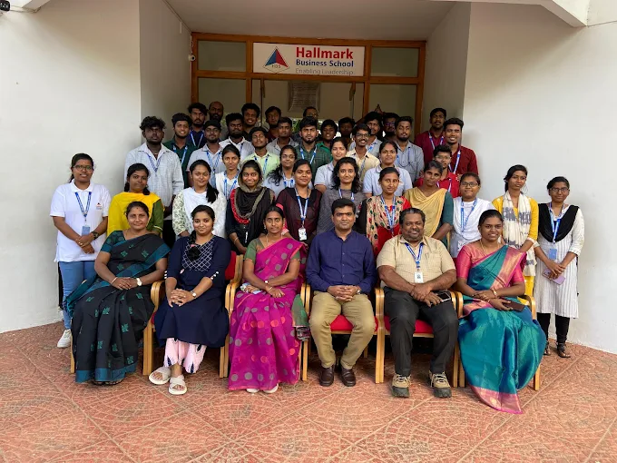A business-school learning community gathered after a professional programme