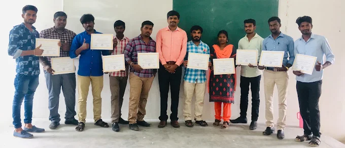 Participants displaying certificates after completing a learning programme