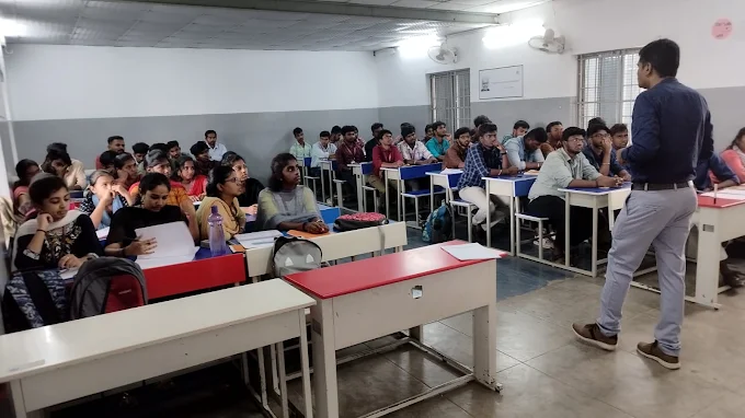 Instructor facilitating a classroom session for students