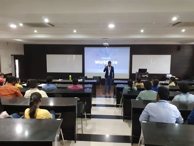Facilitator leading a professional learning session for a large audience